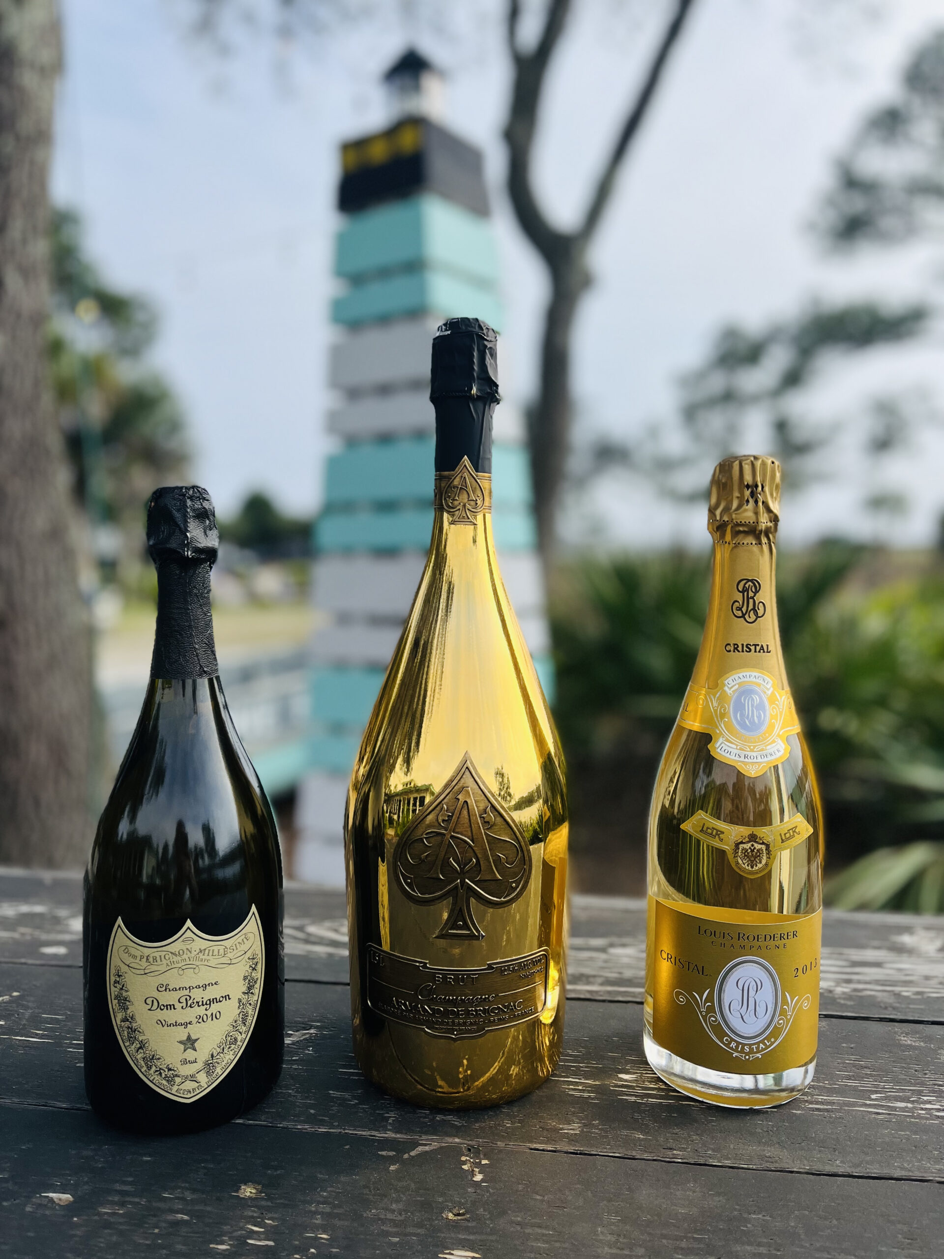 Luxury champagne collection featuring Dom Pérignon, Armand de Brignac Ace of Spades, and Louis Roederer Cristal at Old Florida Fish House.